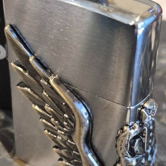Sharp Multisided winged Skull Zippo Lighter